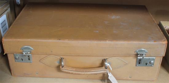 Vintage calf skin suitcase, toilet set with plate-mounted glass fittings & an ivorine-mounted dressing table set